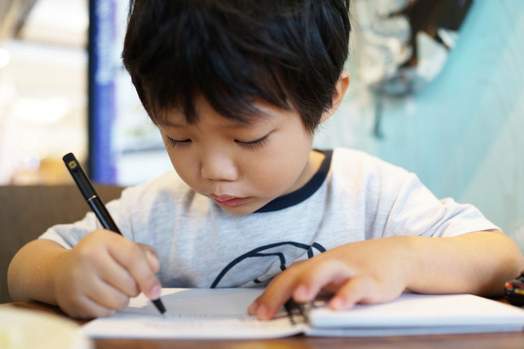 Boy having English Tuition